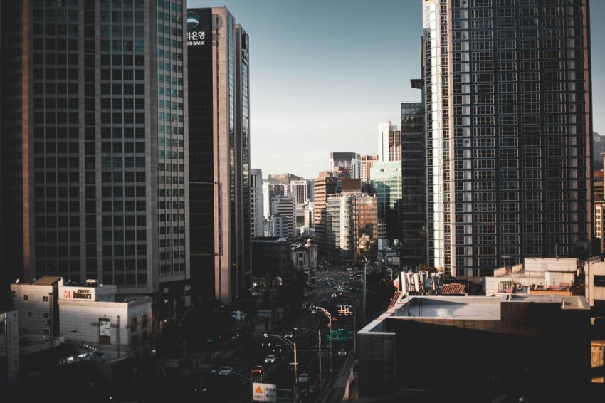 high rise buildings near road during daytime