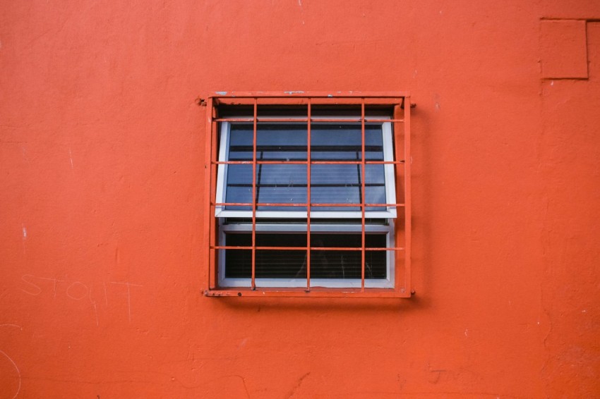 orange metal window grills