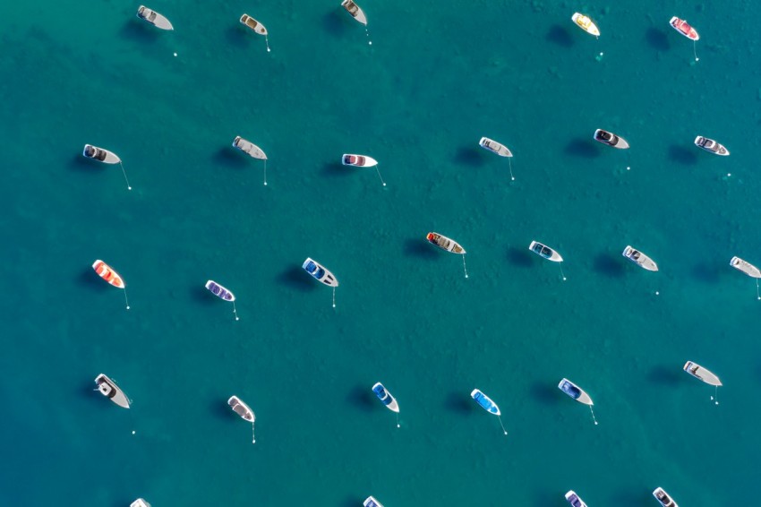 aerial view of boats on sea during daytime