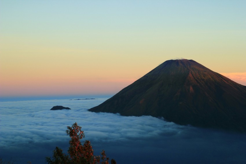 high angle photography of volcano and clouds