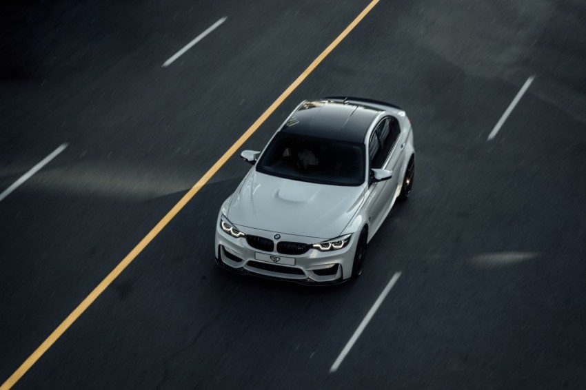 white bmw m 3 on road