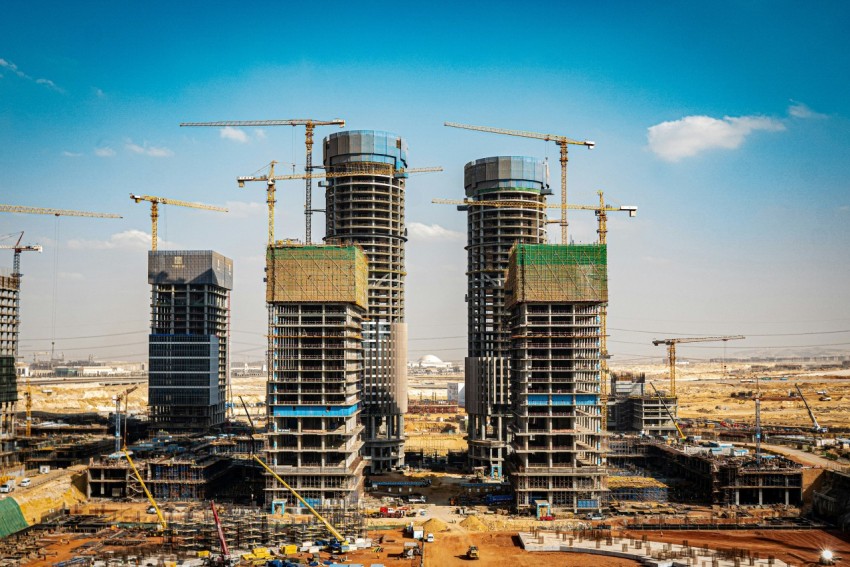 a group of tall buildings under construction