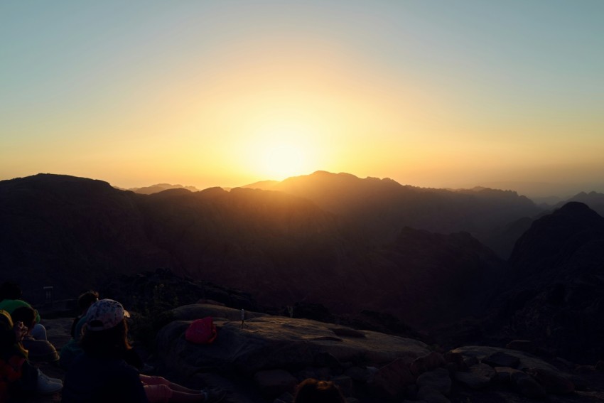 a group of people on a mountain C1