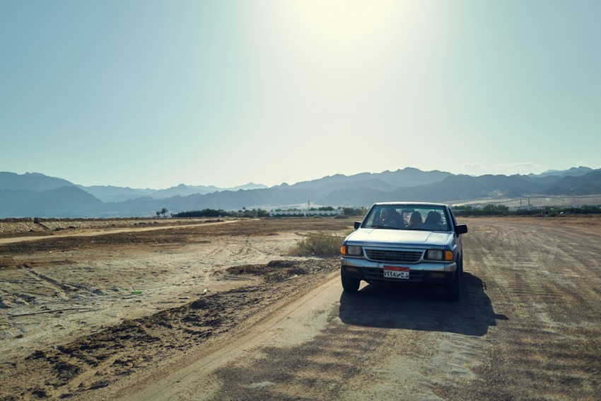 a car driving on a dirt road G1Q