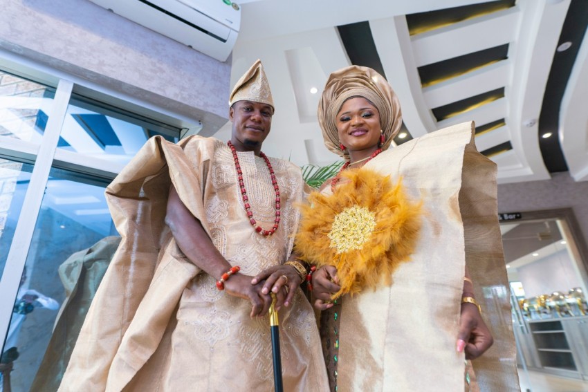 a man and woman wearing traditional clothing