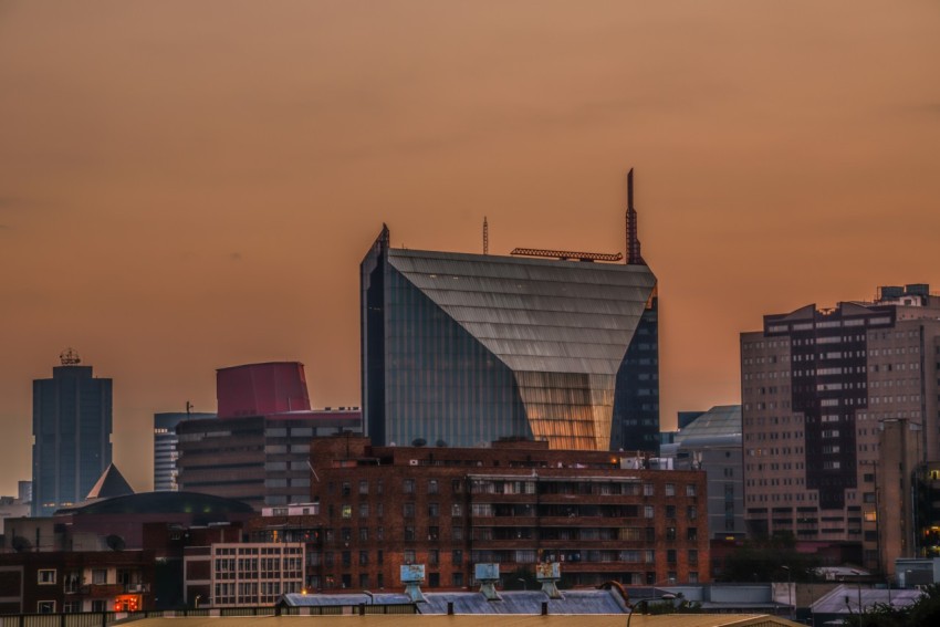 a city skyline with a large building