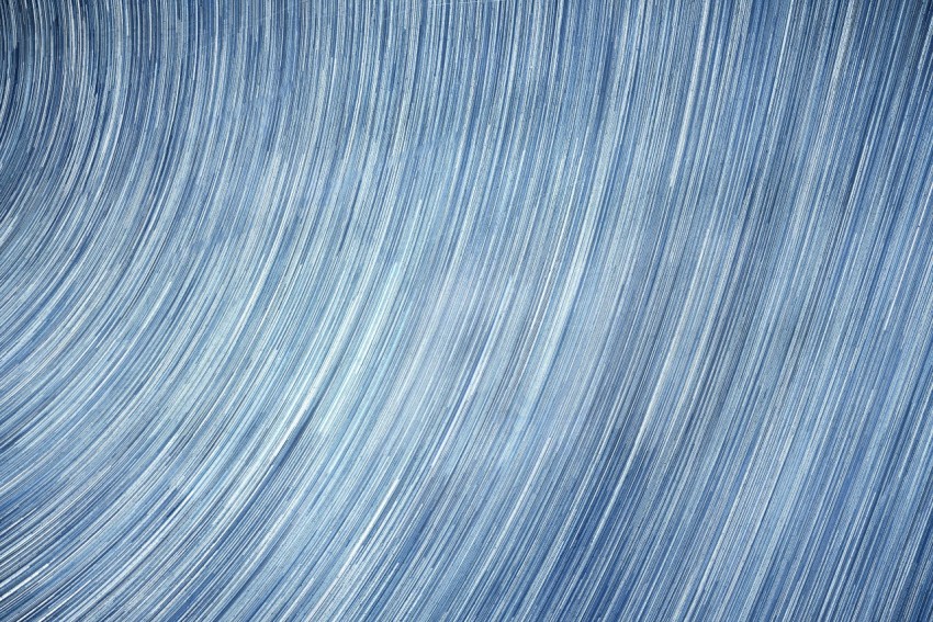 a close up of a blue background with lines