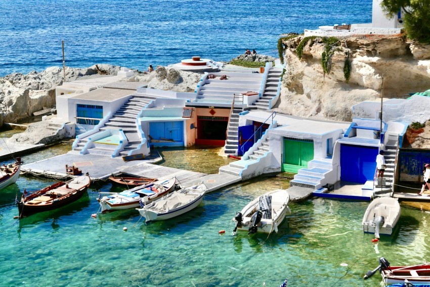 a bunch of boats that are sitting in the water