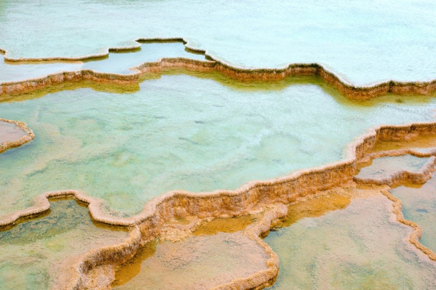 a large body of water surrounded by rocks