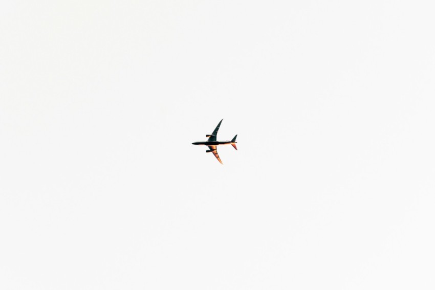 black and gray airplane on sky