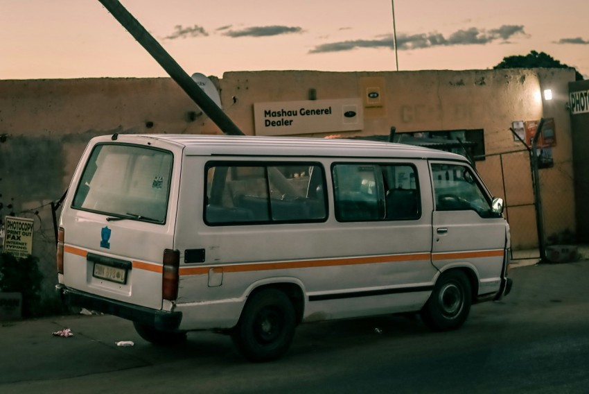 a white van parked on the side of the road