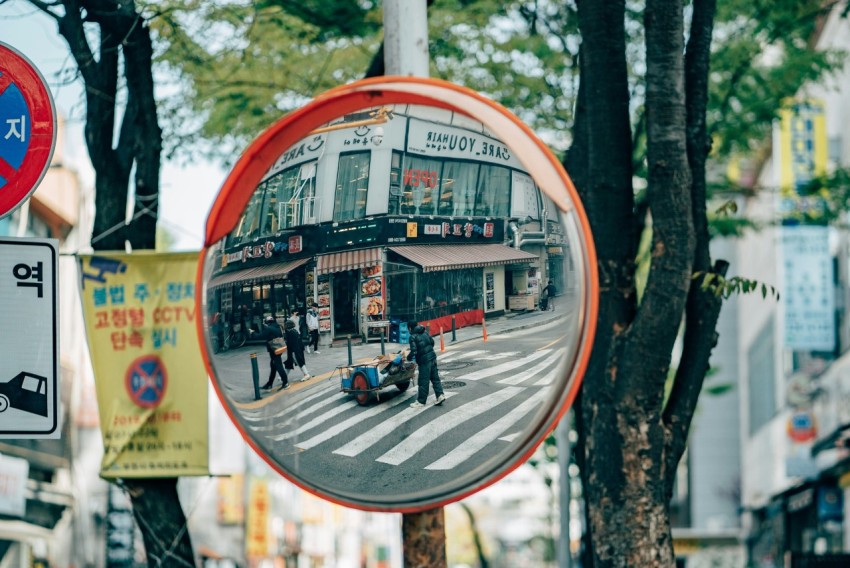 people riding bicycle on road during daytime