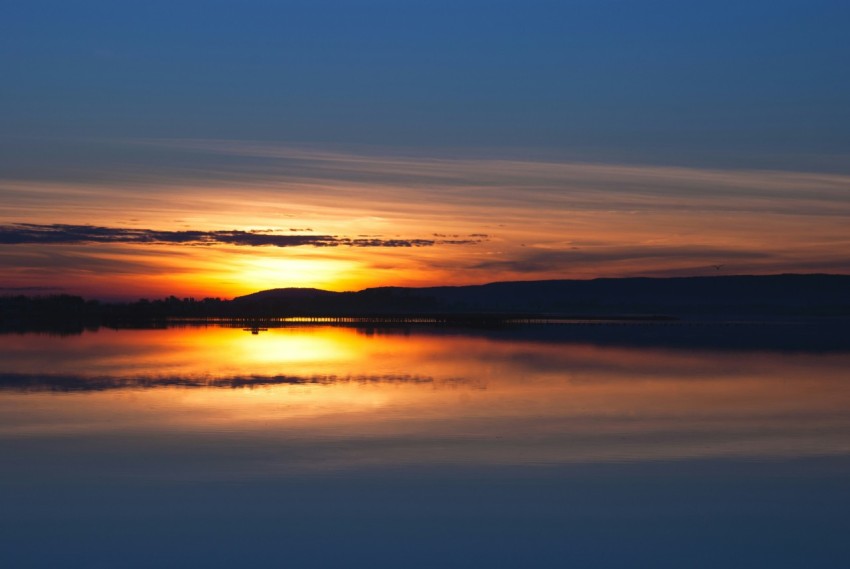 body of water under sunset b