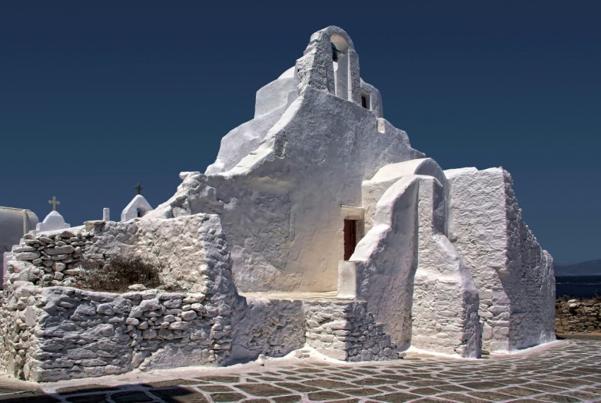 white concrete building under blue sky