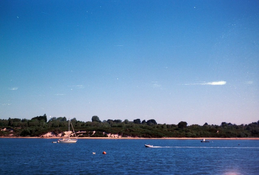 a body of water with boats floating on it