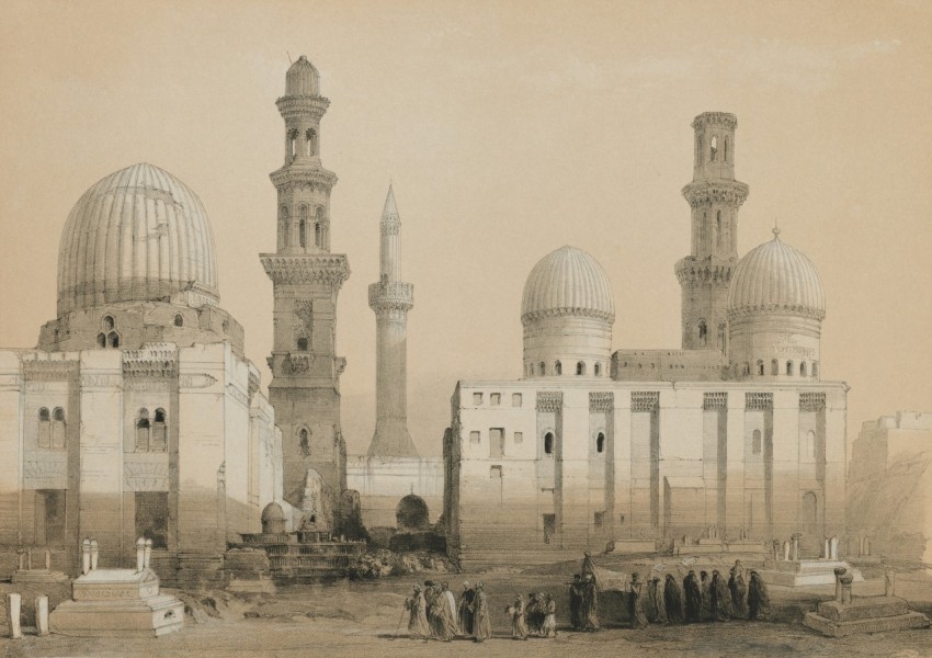 a group of people standing in front of a building Z7yQGB