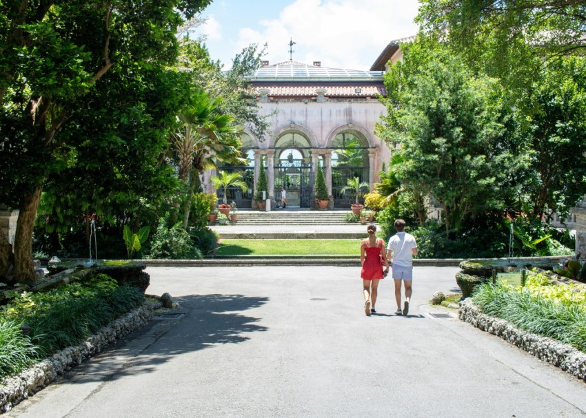 a man and a woman walking down a road