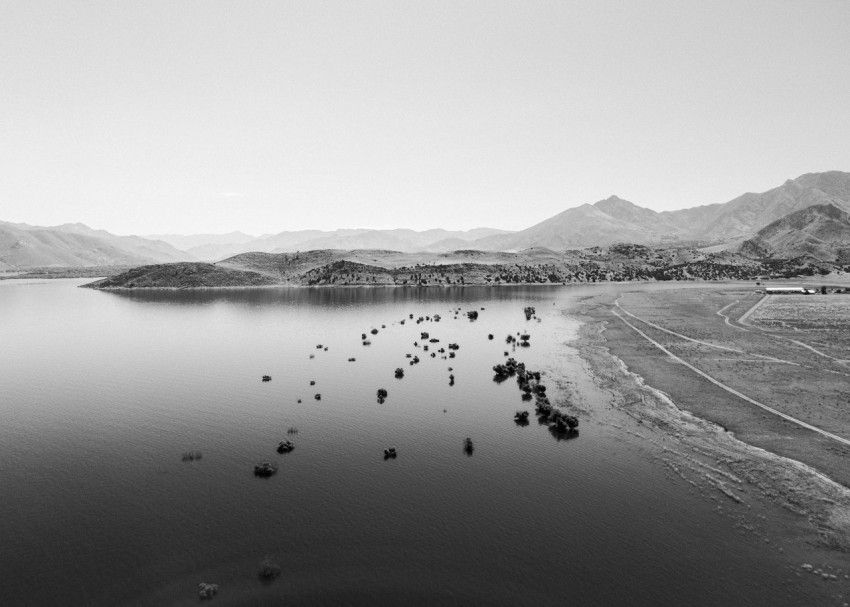 a large body of water surrounded by mountains