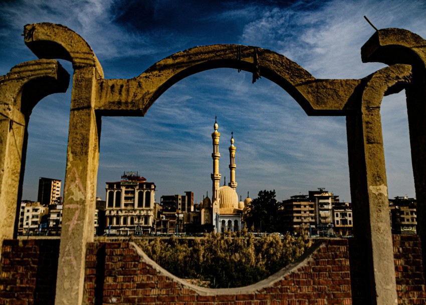 a view of a city through an archway