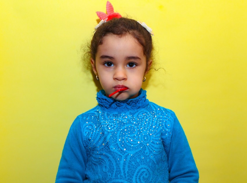 girl in blue long sleeve shirt