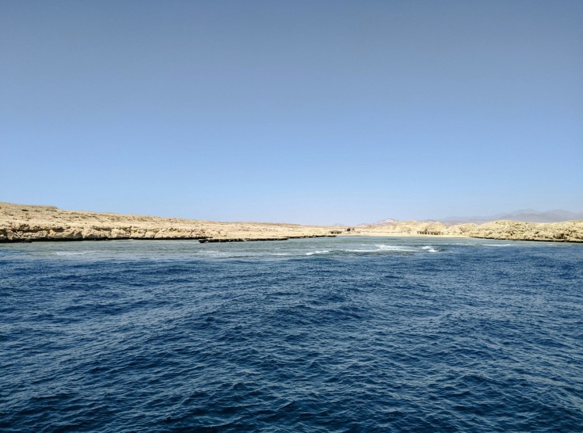 a body of water next to the ocean