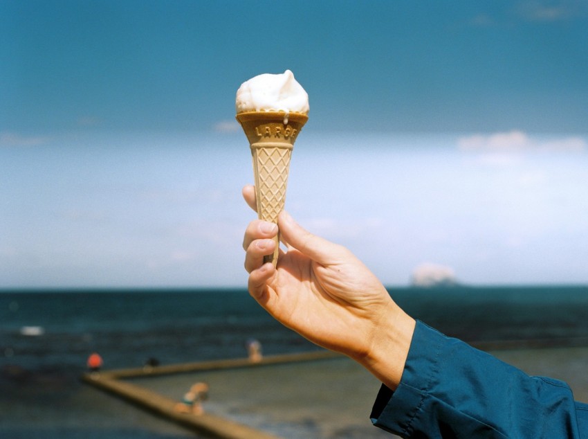 person holding ice cream cone