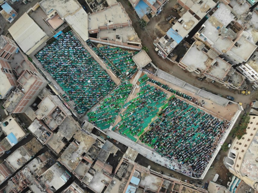 an aerial view of a city with lots of buildings yC