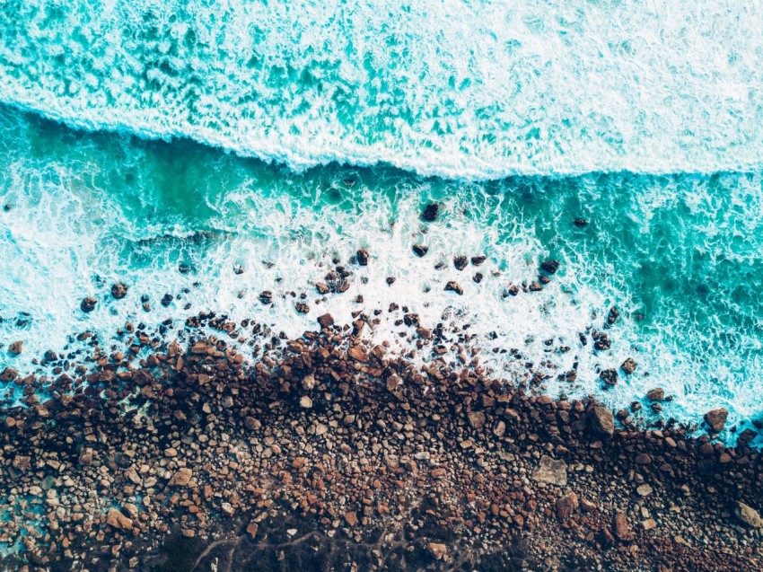 timelapse photo of green sea water and seashore