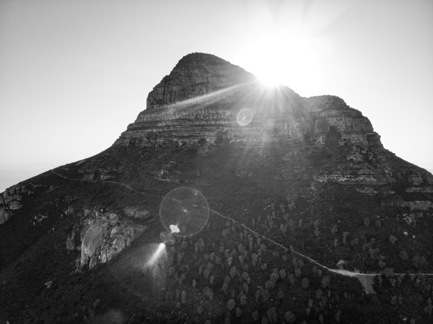 a black and white photo of the top of a mountain