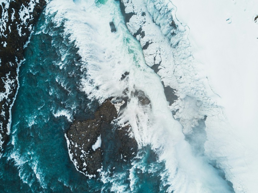 a birds eye view of a snow covered mountain