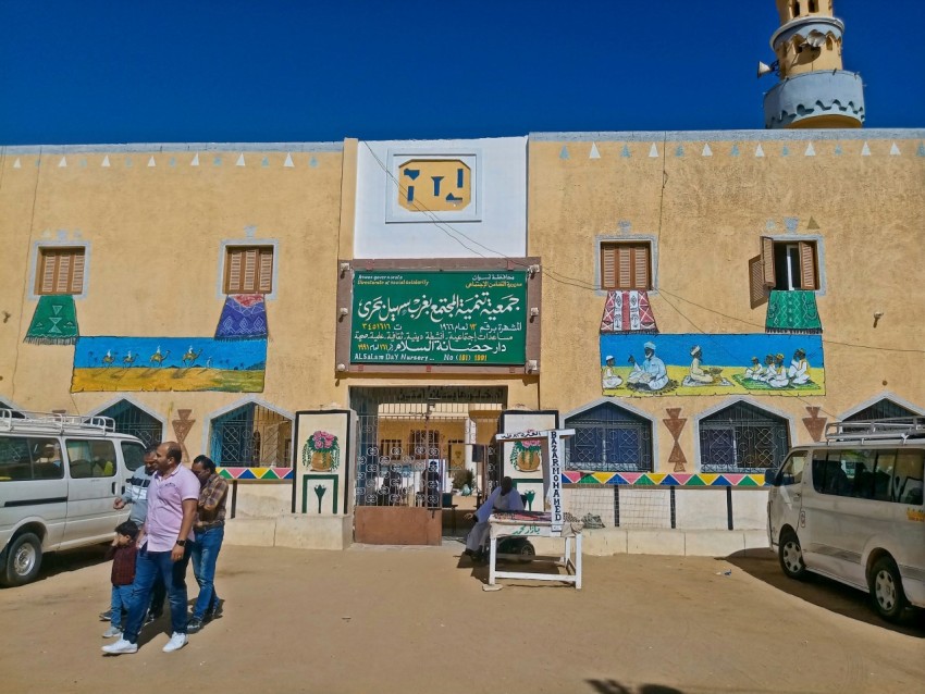 a group of people standing outside a building