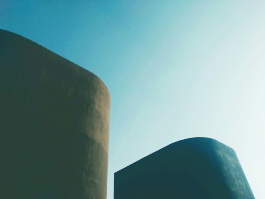 a couple of water tanks sitting next to each other