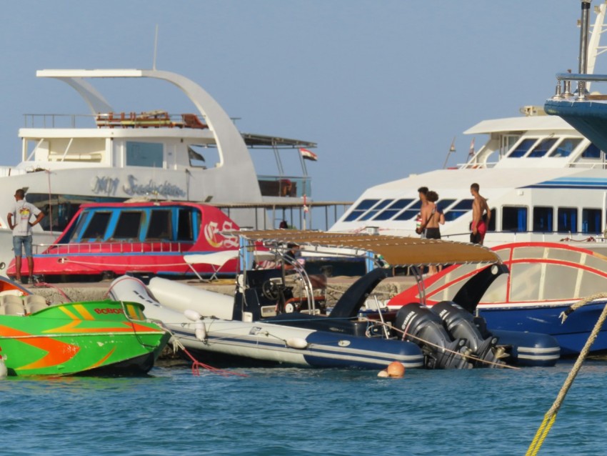 a group of boats in the water