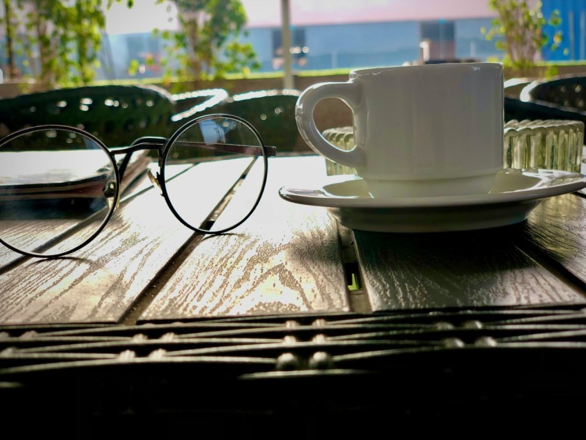 a teacup and glasses on a table