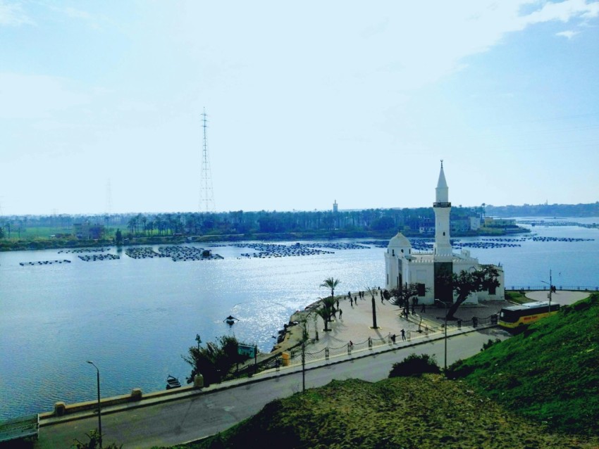 a large body of water with a church on top of it