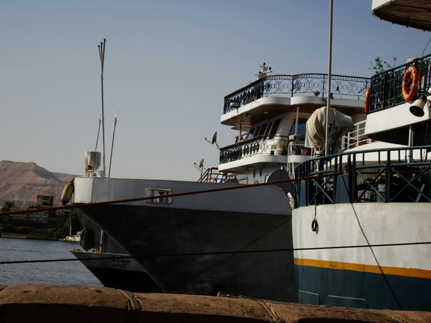 a boat docked at a pier pprn8FHTM