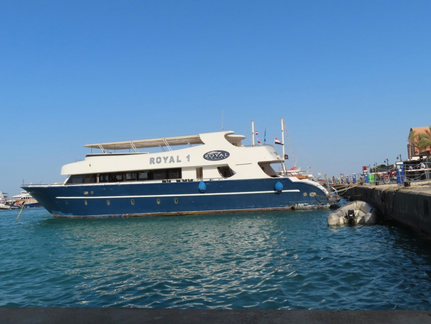 a large white boat in the water KycE