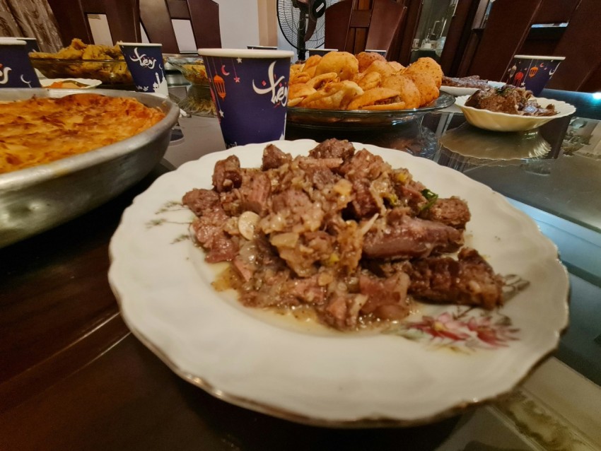 a plate full of food sitting on a table