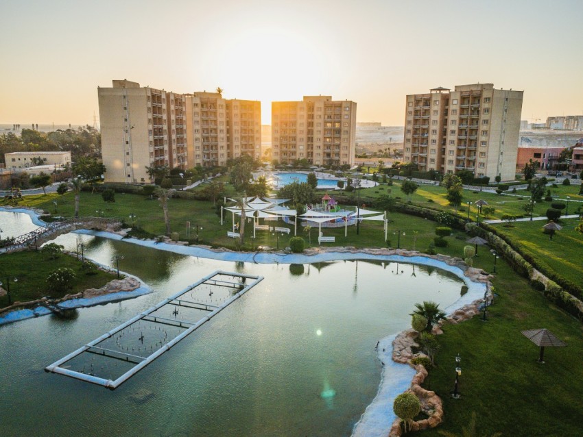 a body of water with buildings around it