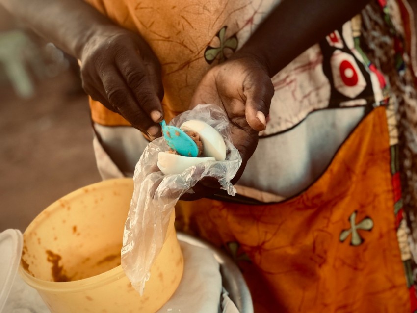 a woman holding a baby in her hands