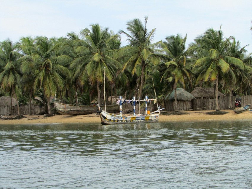 people riding on boat on sea during daytime