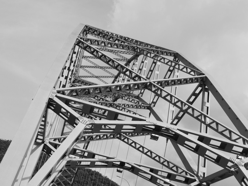 a black and white photo of a bridge