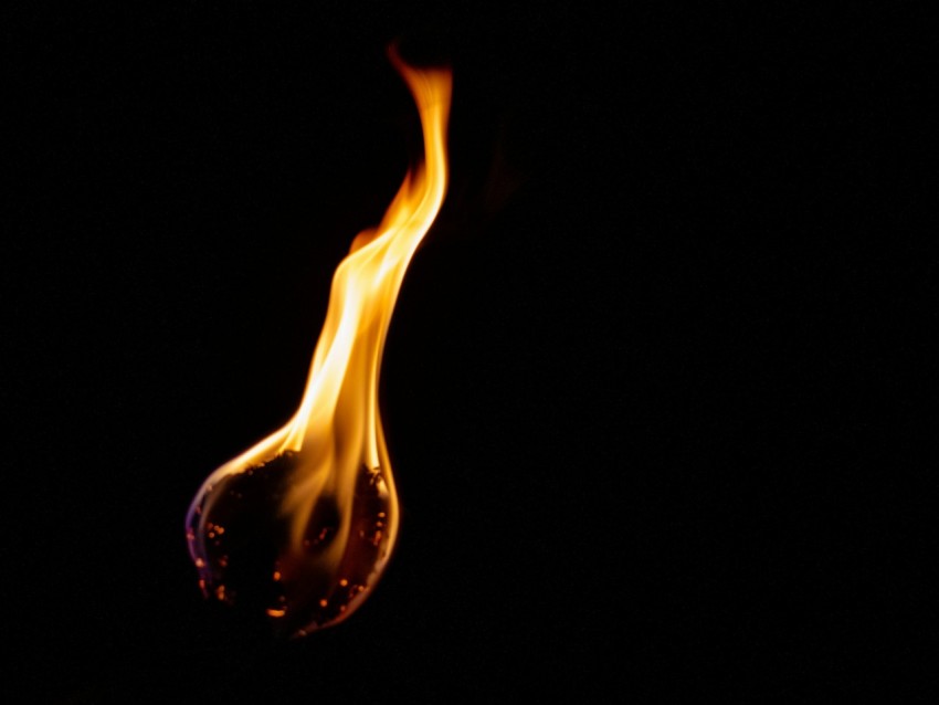 fire in black background with black background