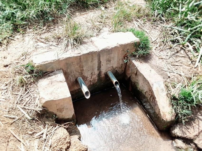 a water drainage pipe in a ditch bdlLs