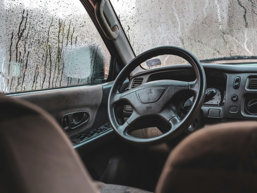 black mitsubishi vehicle steering wheel