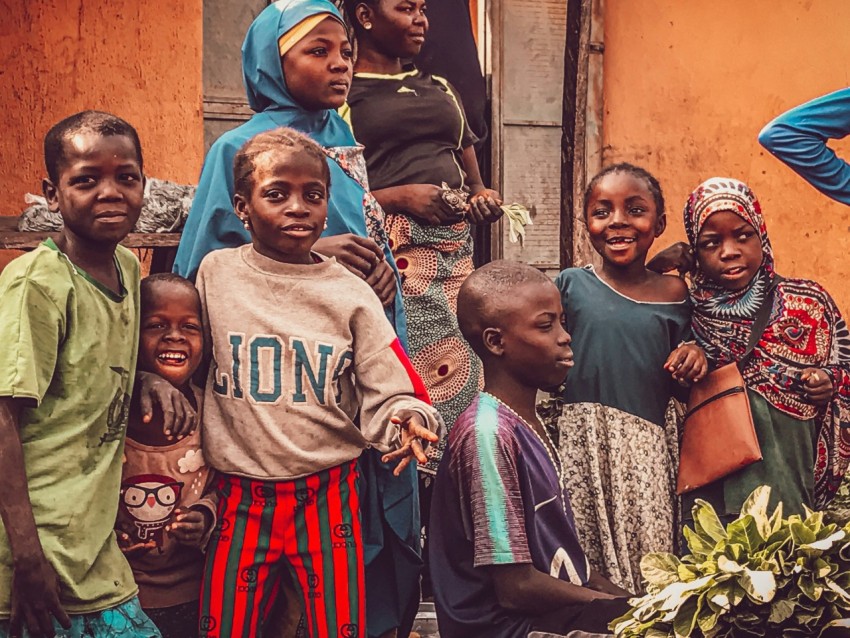 a group of children standing outside