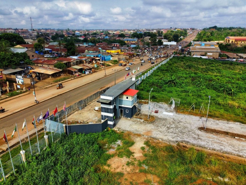 an aerial view of a small town with a bridge ezlxN