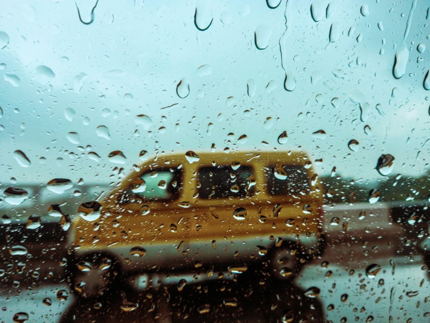 a window with rain drops on it BZWm1xn2