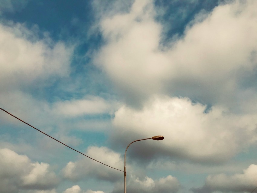 black coated wire under blue sky