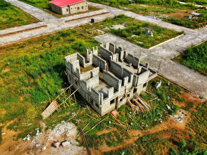 an aerial view of a building in the middle of nowhere